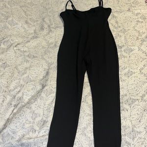 All black one piece set with the jacket